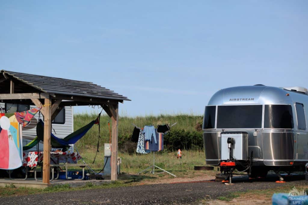 airstream camper by the beach dunes