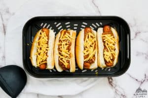 Cheese topped chili dogs