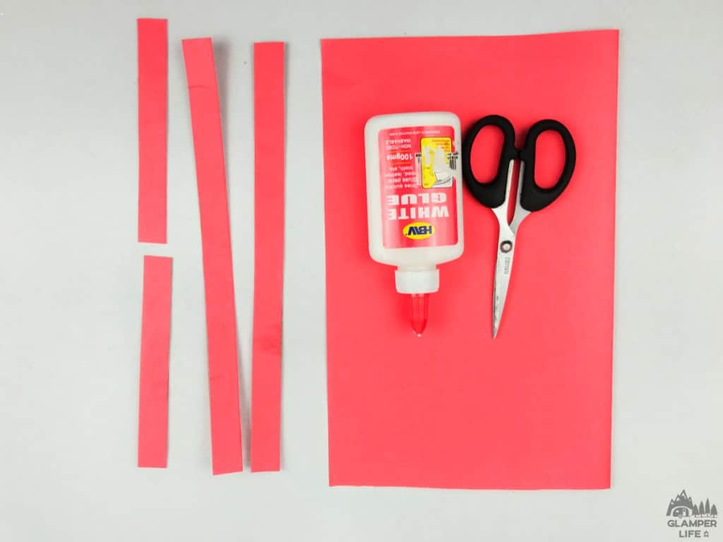 Red paper strips and supplies